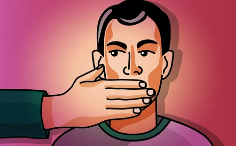 Man forbidden to speak with hand covering his mouth