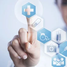 A medical professional pressing a button to denote medical innovation