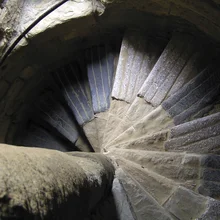 old-stone-spiral-staircase-looking-downwards