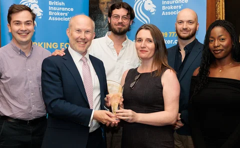 Graeme Trudgill with the Insurance Post team