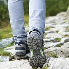 A person walking on uneven ground